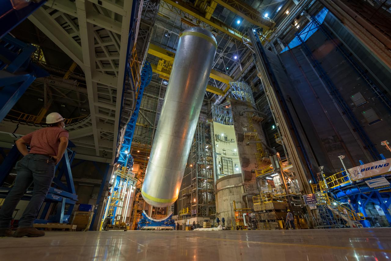 This image highlights the liquid hydrogen tank that will be used on the core stage of NASA’s Space Launch System rocket for Artemis II, the first crewed mission of NASA’s Artemis program. The tank is being built at NASA’s Michoud Assembly Facility in New Orleans. The SLS core stage is made up of five unique elements: the forward skirt, liquid oxygen tank, intertank, liquid hydrogen tank, and the engine section. The liquid hydrogen tank holds 537,000 gallons of liquid hydrogen cooled to minus 423 degrees Fahrenheit and sits between the core stage’s intertank and engine section. The liquid hydrogen hardware, along with the liquid oxygen tank, will provide propellant to the four RS-25 engines at the bottom of the cores stage to produce more than two million pounds of thrust to launch NASA’s Artemis missions to the Moon. Together with its four RS-25 engines, the rocket’s massive 212-foot-tall core stage — the largest stage NASA has ever built — and its twin solid rocket boosters will produce 8.8 million pounds of thrust to send NASA’s Orion spacecraft, astronauts and supplies beyond Earth’s orbit to the Moon and, ultimately, Mars. Offering more payload mass, volume capability and energy to speed missions through space, the SLS rocket, along with NASA’s Gateway in lunar orbit, the human landing system, and Orion spacecraft, is part of NASA’s backbone for deep space exploration and the Artemis lunar program. No other rocket can send astronauts in Orion around the Moon in a single mission.